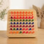 Light up peg board glowing with rainbow LED colors Light up peg board glowing with rainbow LED colors on a tabletop