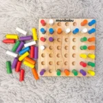 MoniBabu Montessori color sorting toy with 49 wooden rainbow pegs and loose pegs on a soft grey blanket
