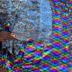 Hand flipping reversible sequin fabric from silver to rainbow