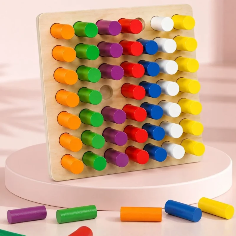 Wooden Montessori color sorting board standing upright with rainbow pegs on a pink display stand